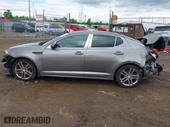 2013 Kia Optima SX z VIN 5XXGR4A65DG120332, wystawiony jako IAAI lot #42323216 z przebiegiem Nie podano mil oraz . Historia ofert i sprzedaży dostępna na DreamBid. Obrazek 14.