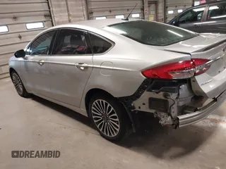 2018 Ford Fusion Titanium with VIN 3FA6P0D91JR138698, listed as a IAAI auction lot 41992522 with 95,017 mi miles and . Bid and sale history available at DreamBid. Image 3.