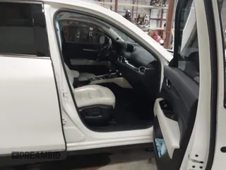2020 Mazda CX-5 Grand Touring with VIN JM3KFBDM6L1828611, listed as a IAAI auction lot 42006976 with 59,939 mi miles and . Bid and sale history available at DreamBid. Image 5.