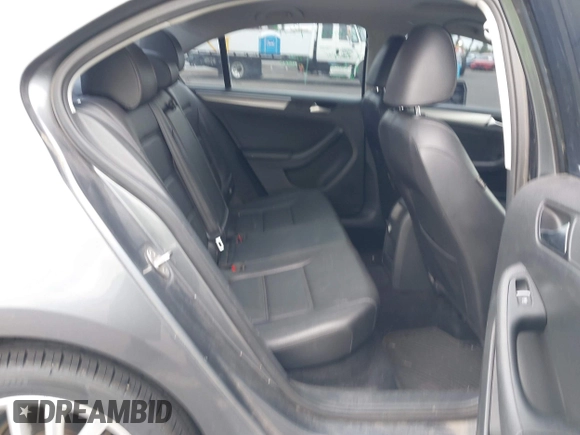 2015 Volkswagen Jetta SE with VIN 3VWD17AJXFM318080, listed as a IAAI auction lot 42119974 with 169,463 mi miles and . Bid and sale history available at DreamBid. Image 8.