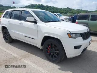 2017 Jeep Grand Cherokee Altitude with VIN 1C4RJFAG4HC864739, listed as a IAAI auction lot 42525748 with 159,388 mi miles and . Bid and sale history available at DreamBid. Image 1.