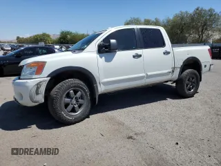 2015 Nissan Titan Pro-4X z VIN 1N6AA0EC9FN512658, wystawiony jako Copart lot #68066964 z przebiegiem 131 026 mil mil oraz Szkoda całkowita • Salvage title. Historia ofert i sprzedaży dostępna na DreamBid. Obrazek 1.
