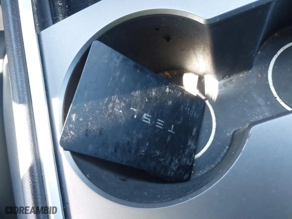 2023 Tesla Model Y Long Range with VIN 7SAYGDEEXPA175104, listed as a IAAI auction lot 41821928 with 52,791 mi miles. Bid and sale history available at carsss.com. Image 11.