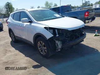2016 Hyundai Santa Fe z VIN 5XYZU3LB4GG343814, wystawiony jako IAAI lot #41984438 z przebiegiem 208 937 mil mil oraz . Historia ofert i sprzedaży dostępna na DreamBid. Obrazek 1.
