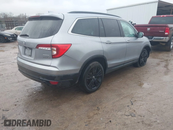 2022 Honda Pilot Special Edition with VIN 5FNYF6H25NB062612, listed as a IAAI auction lot 41543052 with 31,950 mi miles. Bid and sale history available at carsss.com. Image 4.
