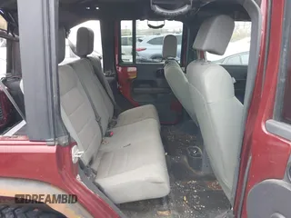 2007 Jeep Wrangler Unlimited Sahara with VIN 1J4GA59177L162022, listed as a IAAI auction lot 41887599 with 207,358 mi miles and . Bid and sale history available at DreamBid. Image 8.
