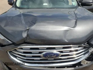 2020 Ford Edge SEL с VIN 2FMPK3J92LBA30123, выставлен на аукционе Copart как лот 63192805 с пробегом 119 534 миль миль и Списание • Salvage title. История ставок и продаж доступна на DreamBid. Изображение 11.