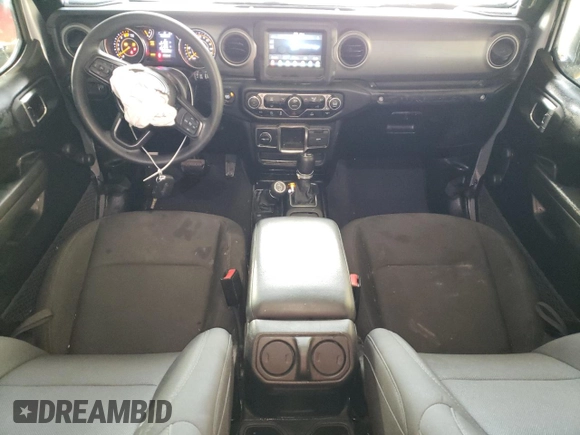 2023 Jeep Wrangler Sport S with VIN 1C4HJXDG0PW670641, listed as a Copart auction lot 41623195 with 27,266 mi miles and Salvage Title. Bid and sale history available at DreamBid. Image 8.