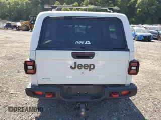 2023 Jeep Gladiator Rubicon with VIN 1C6JJTBG9PL546437, listed as a Copart auction lot 62536575 with 14,106 mi miles and Salvage title. Bid and sale history available at DreamBid. Image 6.