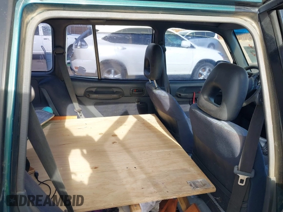 1997 Toyota RAV4 with VIN JT3HP10V2V0147285, listed as a IAAI auction lot 41856796 with 303,535 mi miles and . Bid and sale history available at DreamBid. Image 8.
