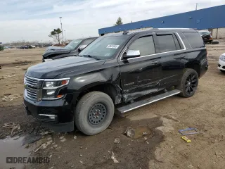 2016 Chevrolet Tahoe LTZ with VIN 1GNSKCKC1GR169159, listed as a Copart auction lot 49651945 with 156,166 mi miles and Salvage Title. Bid and sale history available at carsss.com. Image 1.