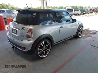 2008 MINI Hardtop S with VIN WMWMF73548TV35548, listed as a IAAI auction lot 42521348 with 104,427 mi miles and . Bid and sale history available at DreamBid. Image 4.