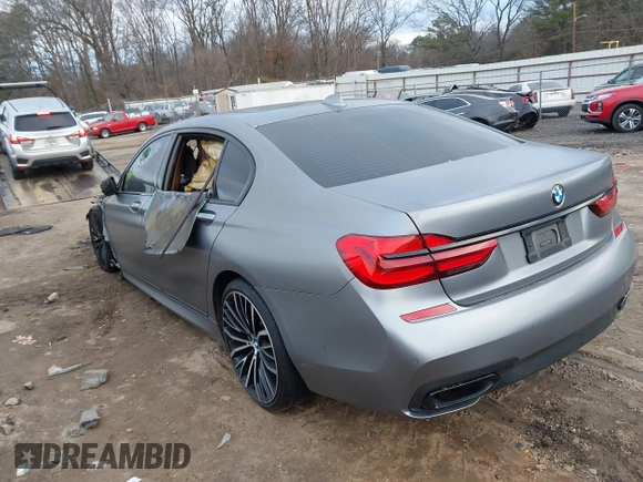 2018 BMW 7 Series 750i with VIN WBA7F0C55JGM23778, listed as a IAAI auction lot 41446517 with 88,498 mi miles. Bid and sale history available at carsss.com. Image 3.