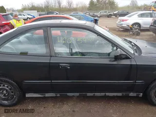 1997 Honda Civic EX with VIN 1HGEJ8242VL044722, listed as a IAAI auction lot 42045941 with 266,481 mi miles. Bid and sale history available at carsss.com. Image 13.