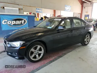 2014 BMW 3 Series 328i xDrive z VIN WBA3B3C59EJ979953, wystawiony jako Copart lot #66109945 z przebiegiem 194 021 mil mil oraz Czysty tytuł • Clean title. Historia ofert i sprzedaży dostępna na DreamBid. Obrazek 1.