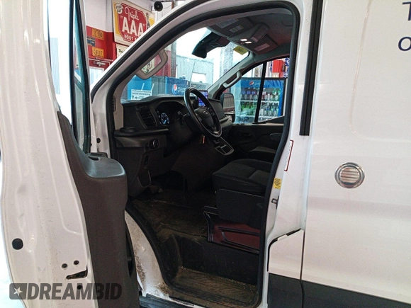 2021 Ford Transit Cargo with VIN 1FTBR2YG2MKA51800, listed as a IAAI auction lot 42793917 with 61,733 mi miles and . Bid and sale history available at DreamBid. Image 11.