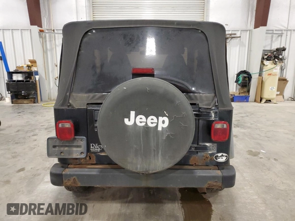 1997 Jeep Wrangler Sport with VIN 1J4FY19S8VP471139, listed as a Copart auction lot 60664255 with 126,710 mi miles and Clean title. Bid and sale history available at DreamBid. Image 6.