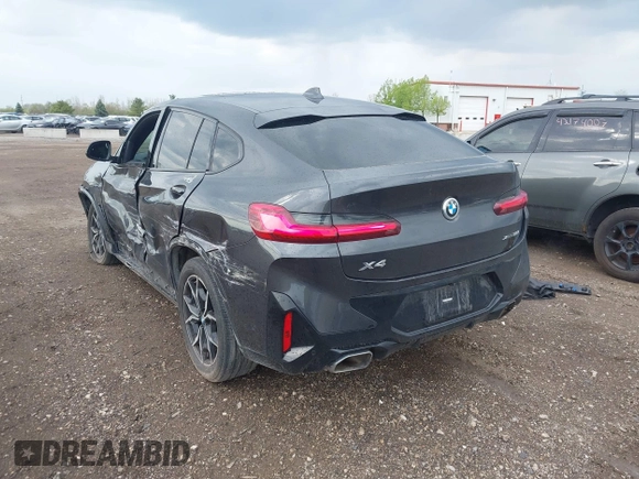 2023 BMW X4 xDrive30i with VIN 5UX33DT01P9N66552, listed as a IAAI auction lot 42103350 with 56,303 mi miles and . Bid and sale history available at DreamBid. Image 3.