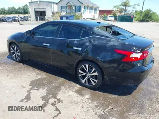 2017 Nissan Maxima SV z VIN 1N4AA6AP7HC409368, wystawiony jako IAAI lot #42253811 z przebiegiem 101 010 mil mil oraz . Historia ofert i sprzedaży dostępna na DreamBid. Obrazek 3.