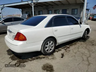 2000 Toyota Avalon XL with VIN 4T1BF28B9YU068001, listed as a Copart auction lot 54958915 with 240,232 mi miles and Salvage Title. Bid and sale history available at DreamBid. Image 3.