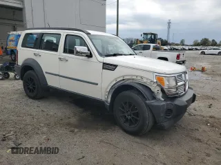 2008 Dodge Nitro SXT with VIN 1D8GU28K08W285099, listed as a Copart auction lot 52709275 with 123,048 mi miles and Salvage Title. Bid and sale history available at DreamBid. Image 4.