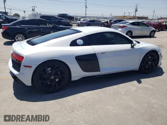 2023 Audi R8 performance quattro z VIN WUACEAFX9P7900103, wystawiony jako Copart lot #57456835 z przebiegiem 5 220 mil mil oraz Szkoda całkowita • Salvage title. Historia ofert i sprzedaży dostępna na DreamBid. Obrazek 3.