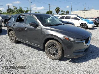 2020 Mazda CX-5 Touring with VIN JM3KFACM7L0766928, listed as a Copart auction lot 52494305 with Not Provided miles and Non Repairable. Bid and sale history available at DreamBid. Image 4.
