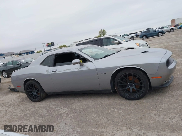 2017 Dodge Challenger R/T Shaker z VIN 2C3CDZBT3HH651390, wystawiony jako IAAI lot #41097999 z przebiegiem 128 289 mil mil oraz . Historia ofert i sprzedaży dostępna na DreamBid. Obrazek 13.