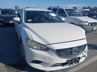 2015 Mazda 6 i Sport with VIN JM1GJ1U59F1211787, listed as a IAAI auction lot 41645517 with 83,537 mi miles. Bid and sale history available at carsss.com. Image 1.