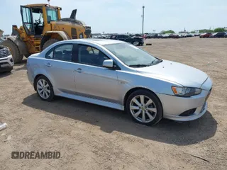 2013 Mitsubishi Lancer GT with VIN JA32U8FW3DU015614, listed as a IAAI auction lot 41820876 with 173,366 mi miles. Bid and sale history available at carsss.com. Image 1.