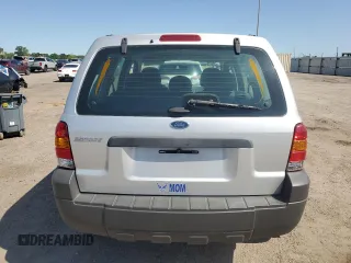 2007 Ford Escape XLS с VIN 1FMYU02Z77KB19323, выставлен на аукционе Copart как лот 52345655 с пробегом 153 509 миль миль и Списание • Salvage title. История ставок и продаж доступна на DreamBid. Изображение 6.