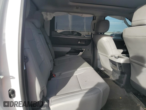 2022 Toyota Tundra Limited z VIN 5TFJA5DB2NX021229, wystawiony jako Copart lot #75503534 z przebiegiem Nie podano mil oraz Szkoda całkowita • Salvage title. Historia ofert i sprzedaży dostępna na DreamBid. Obrazek 10.
