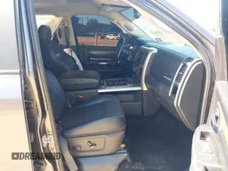 2015 Ram 2500 Laramie z VIN 3C6UR5FL6FG708769, wystawiony jako IAAI lot #42299173 z przebiegiem 101 660 mil mil oraz . Historia ofert i sprzedaży dostępna na DreamBid. Obrazek 5.