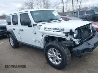 2021 Jeep Wrangler Unlimited Willys Sport with VIN 1C4HJXDG8MW596171, listed as a IAAI auction lot 41856841 with 86,353 mi miles and . Bid and sale history available at DreamBid. Image 14.