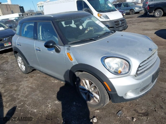 2012 MINI Cooper Countryman with VIN WMWZB3C50CWM04795, listed as a IAAI auction lot 41414790 with NaN miles. Bid and sale history available at carsss.com. Image 1.