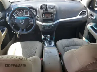2015 Dodge Journey SXT with VIN 3C4PDCBG5FT628212, listed as a Copart auction lot 60663695 with 145,024 mi miles and Salvage title. Bid and sale history available at DreamBid. Image 8.