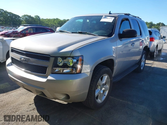 2007 Chevrolet Tahoe LT with VIN 1GNFK13097R174619, listed as a IAAI auction lot 42335491 with 207,265 mi miles and . Bid and sale history available at DreamBid. Image 2.