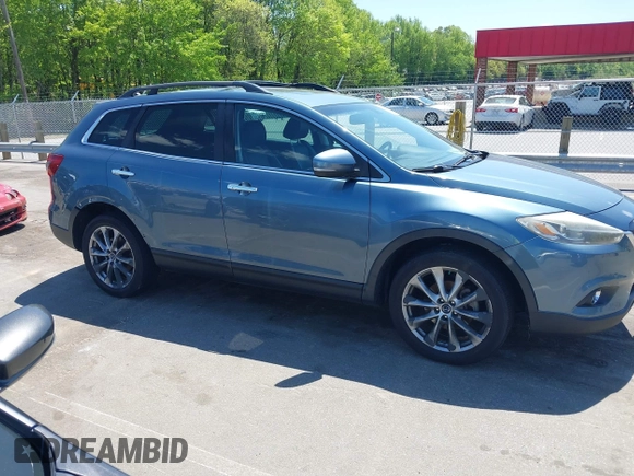 2015 Mazda CX-9 Grand Touring with VIN JM3TB3DV4F0448210, listed as a IAAI auction lot 42061711 with 149,289 mi miles. Bid and sale history available at carsss.com. Image 13.