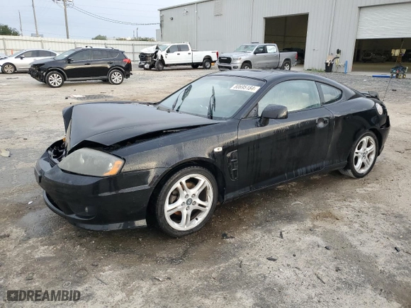 2006 Hyundai Tiburon GT with VIN KMHHN65FX6U224913, listed as a Copart auction lot 80695184 with 146,676 mi miles and Salvage Title. Bid and sale history available at carsss.com. Image 1.