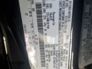 2015 Ford Focus Titanium with VIN 1FADP3J29FL311471, listed as a Copart auction lot 87805235 with 195,026 mi miles and Salvage Title. Bid and sale history available at carsss.com. Image 12.