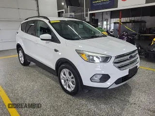 2018 Ford Escape SE z VIN 1FMCU9GD4JUA76194, wystawiony jako IAAI lot #42421138 z przebiegiem 47 896 mil mil oraz . Historia ofert i sprzedaży dostępna na DreamBid. Obrazek 5.