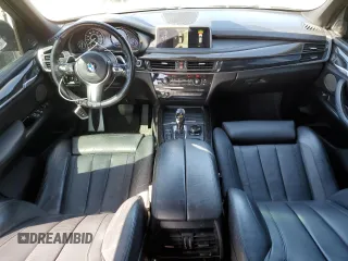 2014 BMW X5 xDrive50i with VIN 5UXKR6C51E0J73170, listed as a Copart auction lot 49260175 with 129,625 mi miles and Salvage Title. Bid and sale history available at carsss.com. Image 8.