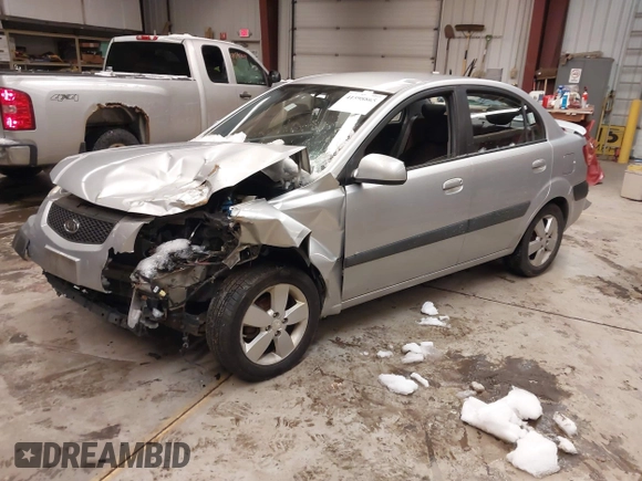 2009 Kia Rio LX with VIN KNADE223596444133, listed as a IAAI auction lot 41598865 with Not Provided miles and . Bid and sale history available at DreamBid. Image 17.