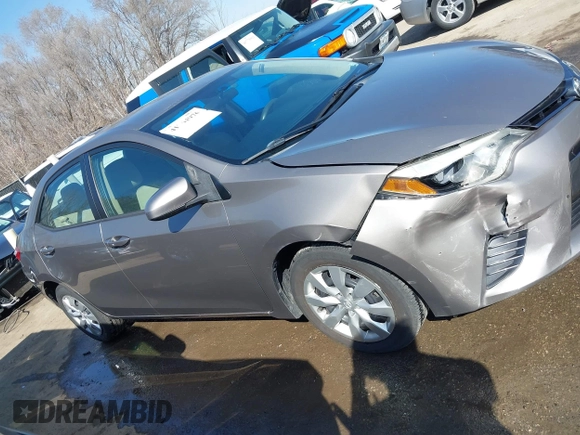 2015 Toyota Corolla L with VIN 5YFBURHE5FP345234, listed as a IAAI auction lot 41764976 with 221,888 mi miles and . Bid and sale history available at DreamBid. Image 13.
