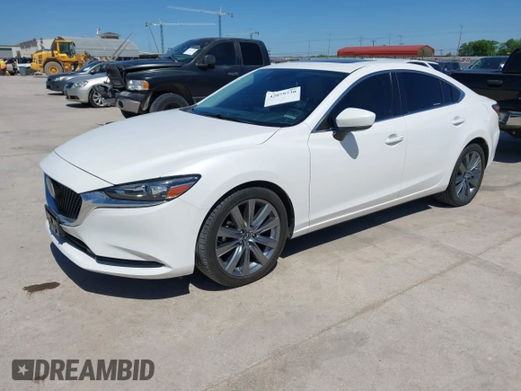 2021 Mazda 6 Touring with VIN JM1GL1VM4M1618686, listed as a IAAI auction lot 42079730 with 55,539 mi miles and . Bid and sale history available at DreamBid. Image 17.