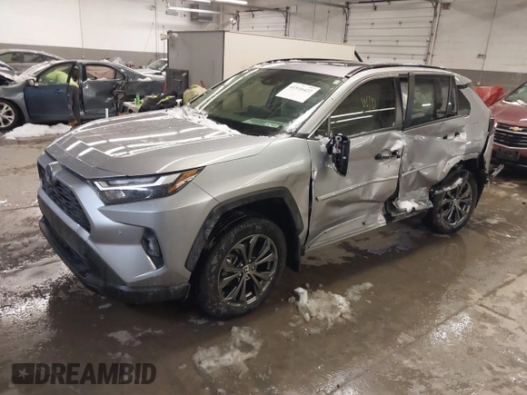 2024 Toyota RAV4 Hybrid XLE Premium with VIN JTMB6RFV5RD148973, listed as a IAAI auction lot 41516422 with 8,797 mi miles. Bid and sale history available at carsss.com. Image 2.