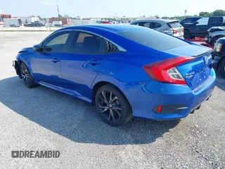 2019 Honda Civic Sport with VIN 19XFC2F83KE014463, listed as a IAAI auction lot 41439533 with 84,379 mi miles and . Bid and sale history available at DreamBid. Image 3.