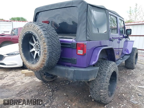 2018 Jeep Wrangler Unlimited Sport S with VIN 1C4BJWDG6JL882596, listed as a IAAI auction lot 42099289 with 121,714 mi miles and . Bid and sale history available at DreamBid. Image 4.