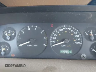 1999 Jeep Grand Cherokee Limited with VIN 1J4GW68NXXC727844, listed as a IAAI auction lot 41290773 with 222,838 mi miles. Bid and sale history available at carsss.com. Image 7.
