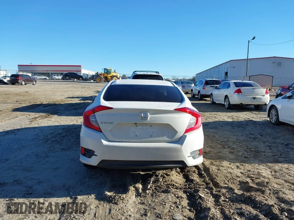 2017 Honda Civic LX z VIN 19XFC2F50HE007646, wystawiony jako IAAI lot #41360121 z przebiegiem 133 800 mil mil oraz . Historia ofert i sprzedaży dostępna na DreamBid. Obrazek 16.